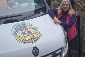 The Doggie Bus and owner, Lisa Pinardi.