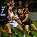 Castleford Tigers full-back Niall Evalds take on the Wakefield Trinity defence. Picture: Jonathan Gawthorpe