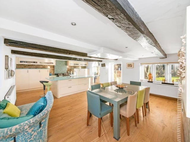 The stunning open plan kitchen and diner, with a central island.