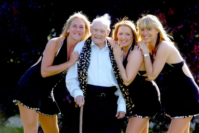 Girl trio band 'Caution' made a home visit to Les Hawkins, aged 96, of  Ackworth. The girls appeared on the TV show X Factor and were slated by pop guru Simon Cowell, so Les spoke out in support of the girls. Left to right, Lisa Pearson, Julie Blackburn and Kirsten Allan.