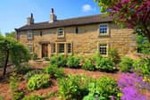 An exterior view of Grade ll-listed Priory Cottage.