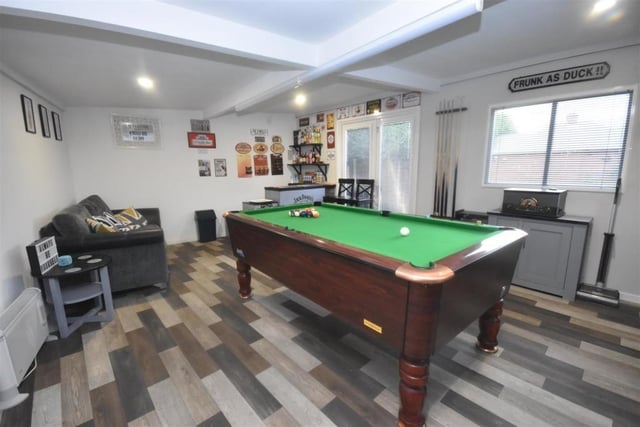 The versatile games room annexe could easily suit another purpose such as a home office or treatment room.