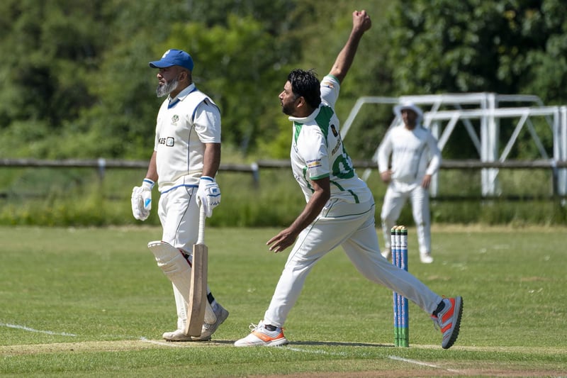Syed Ahsan Shah on his way to taking 5-40 for Crofton Phoenix in their win over Nostell St Oswald.