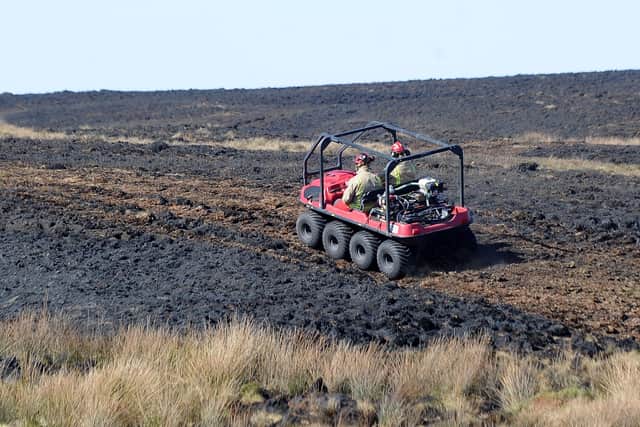 Working to dampen down the moor at Widdop Moor, near Hebden Bridge, after the Moorland Fire on Sunday..20th April 2019 ..Picture by Simon Hulme 
