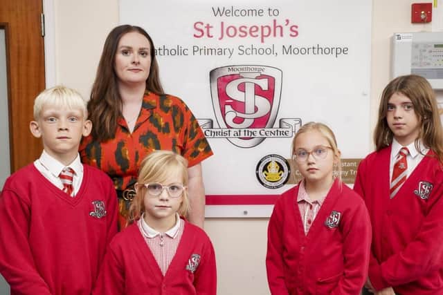 Headteacher Kelly Picton and pupils at St Joseph's Primary School in Moorthorpe.The school has been broken into twice in a matter of days.Picture Scott Merrylees