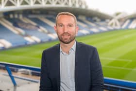 Former professional footballer John McCombe at the Accu Stadium, home to Huddersfield Town.