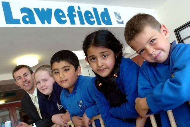 Good Ofsted for Lawefield Lane Primary School in 2007, celebrating is Headteacher Craig Batley, Chloe Hinchcliffe, Danyaal Mirza, Safa Khan, Calum Humphreys.