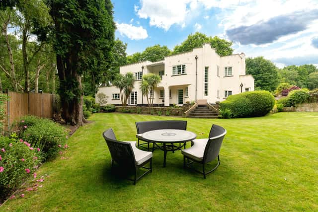 Lawned and landscaped gardens are private, with seating areas.