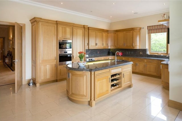 The property features a bespoke fitted breakfast kitchen.