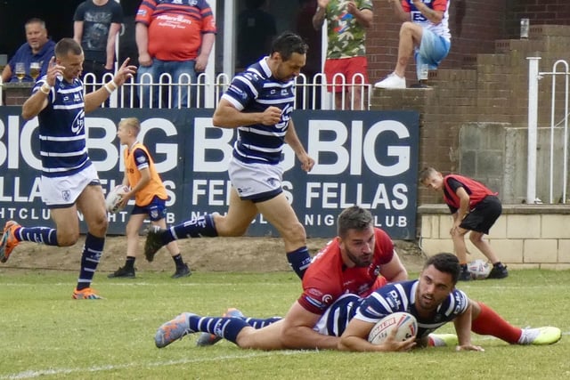 Caleb Aekins looks up after getting the ball down for a try.