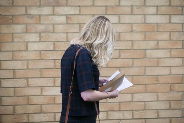 A-level students across the district will be picking up their exam results on Thursday with many keeping their fingers crossed for the grades they need to get into university.