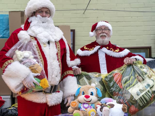 Paul Glover and Mick New are 'Two Santa's Going to Ukraine' to deliver presents to children.