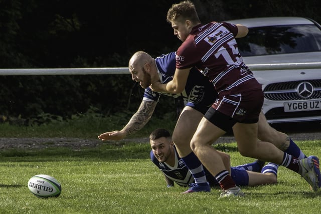 Sam Millard reaches out to ground the ball for Pontefract's first try against Morley. Picture: Jonathan Buck
