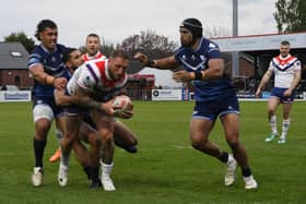 Josh Griffin forces his way over for a try for Wakefield Trinity in their 28-12 win over Toulouse. Picture: Rob Hare