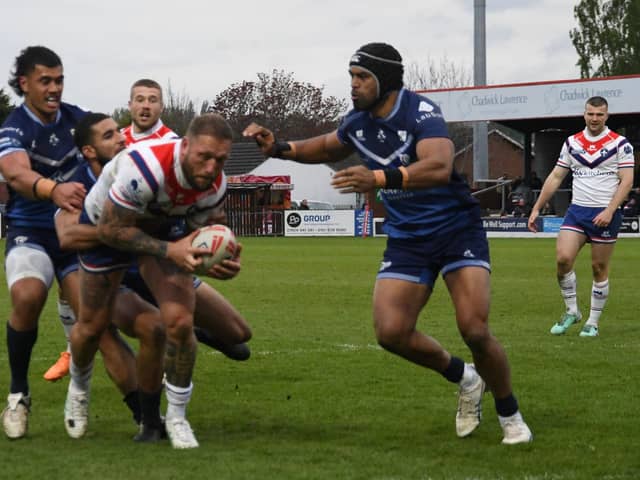 Josh Griffin forces his way over for a try for Wakefield Trinity in their 28-12 win over Toulouse. Picture: Rob Hare
