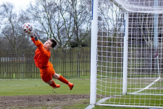 Hemsworth MW goalkeeper Ally Hughes makes a flying save.