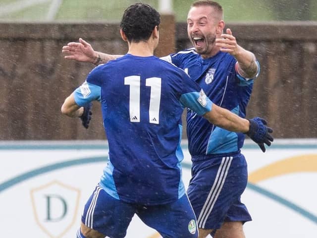 Josh Askew celebrates his goal for Ossett United at Silsden. Picture: Jessica Garside