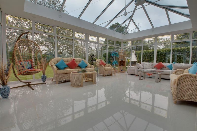 The stunning conservatory is a versatile room, with lovely views of the gardens.
