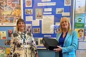 Kate Caryl, Headteacher at Wakefield Independent school, holding a donated device, with Emma Caryl, Recruitment Specialist in Primary Education at Hays.