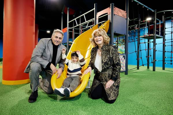Coun Denise Jeffery with The Ridings’ owner, Mr Zahid Iqbal, and his grandson.