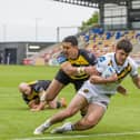 George Hirst scores the first try for Castleford Tigers at York. Picture: Tony Johnson