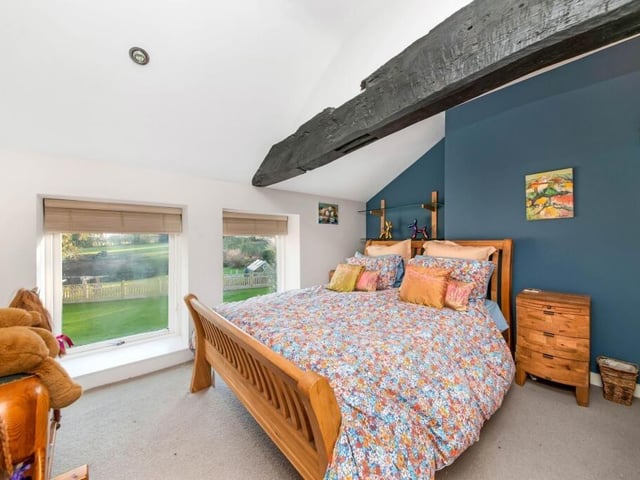 Another bedroom, with glorious garden views.