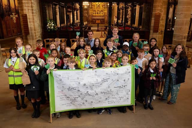 A celebration to mark the completion of a climate change relay by Wakefield district schoolchildren has been held at the city's cathedral.