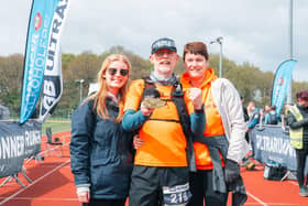 Simon Speight pictured with wife Rachael and daughter Megan after completing the arduous Chester Ultra 100, where he came fourth in his age category.