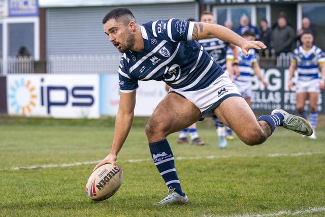 Caleb Aekins touches the ball down for a Featherstone Rovers try.