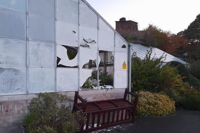 Smashed windows at the rose garden conservatory in Wakefield's Thornes Park