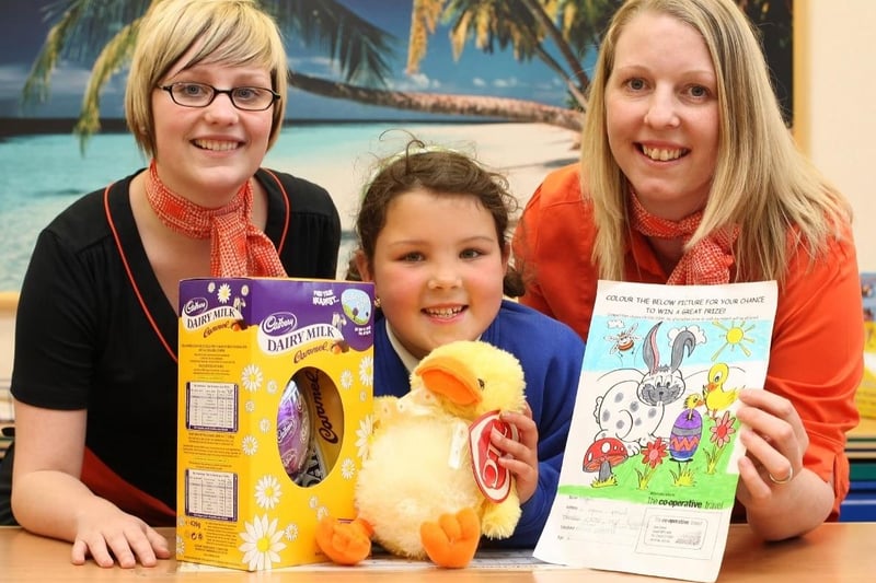 Maggie Dearnley won the Coop Travel Easter colouring competition in Ossett, with Faye White (manager) and Hayley Atkinson (customer service manager)