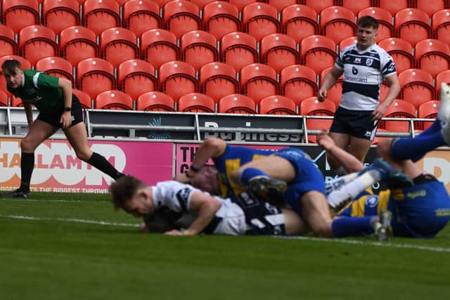 Ben Reynolds scores a try on his return to the Featherstone Rovers team at Doncaster. Picture: Rob Hare