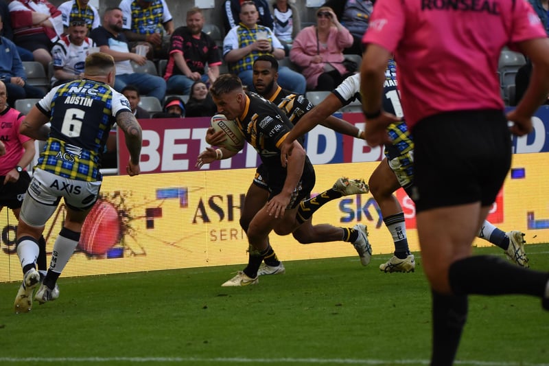 Alex Mellor charges in for one of his two tries against Leeds Rhinos.