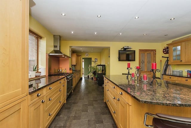 An alternative view of the extensive fitted breakfast kitchen with granite worktops.