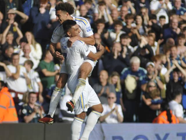 Joel Piroe celebrates his winning goal with Leeds United teammate Ethan Ampadu.