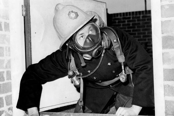 4. A firefighter at Old Ossett fire station in the 1960s.