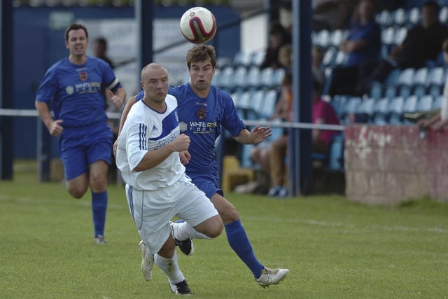 Pontefract Collieries striker Steve Lyon comes up against Hemsworth MW's Andrew Hart in the opening game of the 2012-13 season. Hemsworth won 1-0 but Colls bounced back with a 3-1 win over Cleethorpes Town.