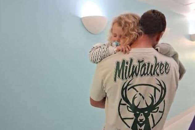 Thea-Mae with dad Alex before her last Radiotherapy session.