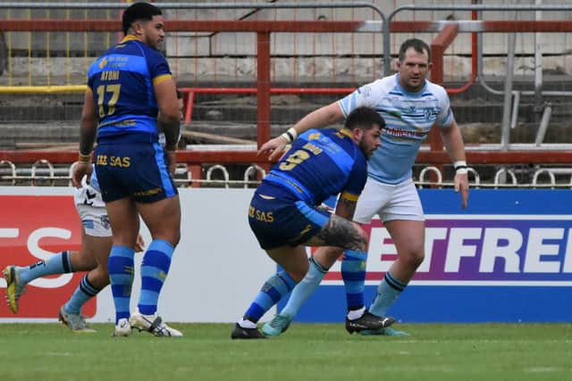 Wakefield Trinity hooker Liam Hood attacks the Featherstone Rovers line. Picture: Rob Hare