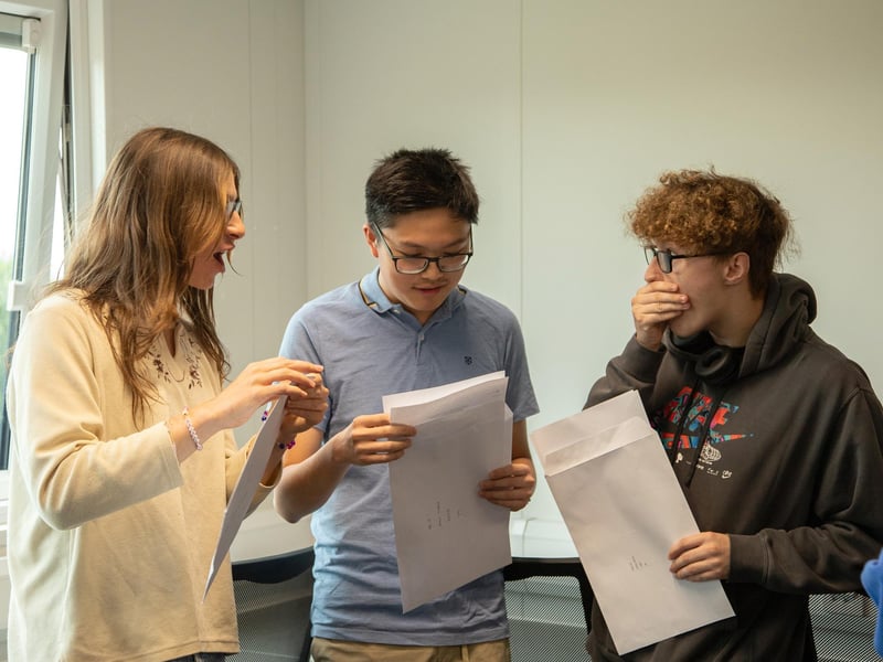 Students receiving their A-level results at Woodkirk Academy