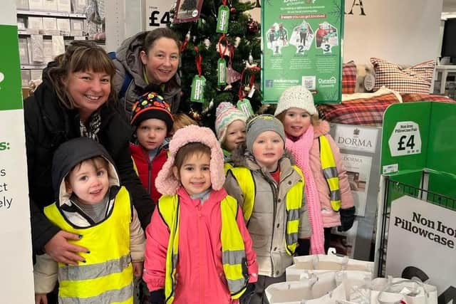 Lucy Lovell, Deputy Manager, and Lisa Olsen from Dewsbury's Child’s Play Nursery took a group of children on an adventure to deliver presents to Dunelm, Wakefield, for its Delivering Joy campaign.