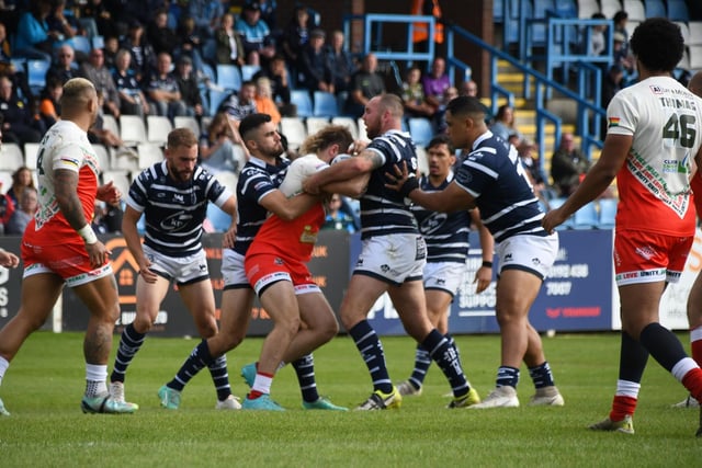No way through for Keighley as Caleb Aekins and Daniel Smith lead the Featherstone Rovers tackling.