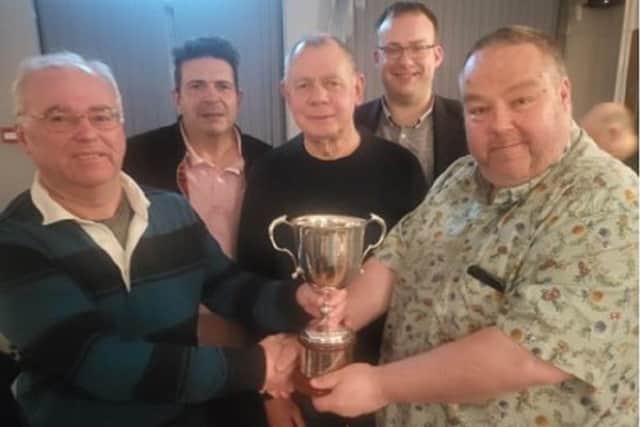 FTQL 2022-23 Handicap Cup winners Flanagan’s Army (from left): Duncan Cooper (captain), Jim Linacre, Dave Wheatley, Ashley Handley, David Bill (League chair).