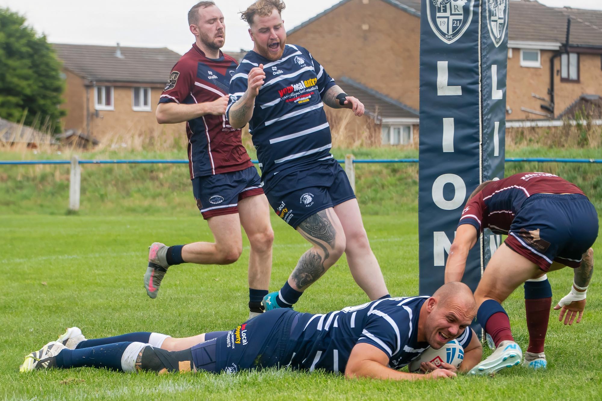 Nathan Hammond crashes over for a first half try for Featherstone Lions.