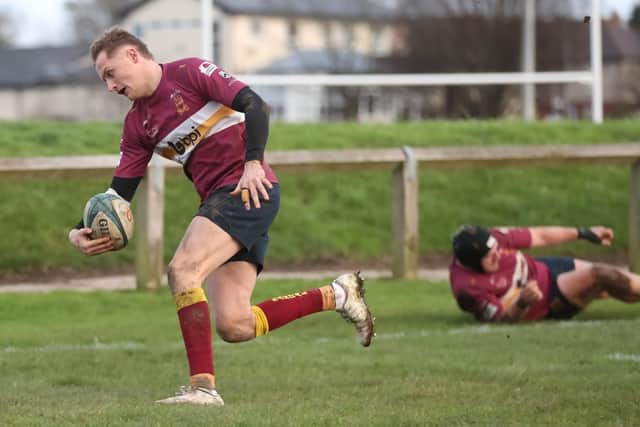 Jake Adams races over for a Sandal try. Picture: Simon Hall