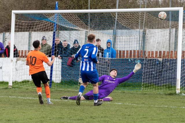 Frickley Athletic goalkeeper Harrison Davison-Hale makes an outstanding save, but was beaten six times in the game with Hallam. Picture: John Hobson
