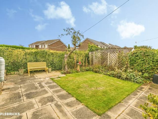 Externally, the property benefits from a private garden, providing a pleasant space for outdoor dining, relaxation and entertaining.