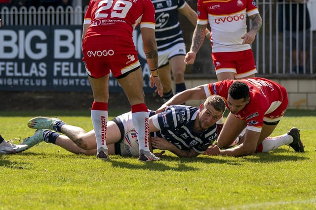Josh Hardcastle looks up after touching the ball down over the line for Featherstone Rovers' first try.