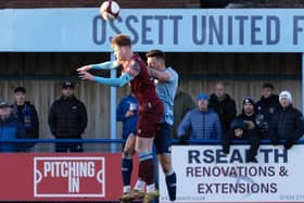 Jerome Greaves climbs high to try to win the ball for Pontefract Collieries at Ossett United. Picture: Scott Merrylees