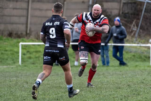 Adam Biscomb on the charge for Normanton Knights against Saddleworth Rangers. Picture: Scott Merrylees